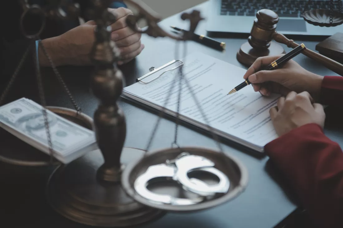 justice-law-conceptmale-judge-courtroom-with-gavel-working-with-computer-docking-keyboard-eyeglasses-table-morning-light